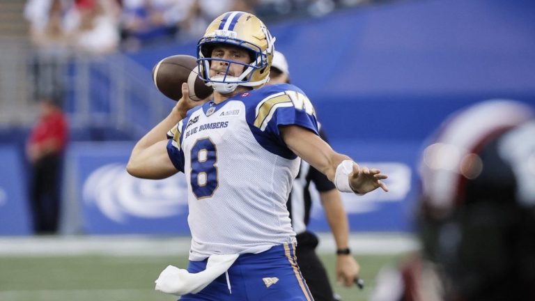 Winnipeg Blue Bombers quarterback Zach Collaros gets set to throw a touchdown pass to Jerreth Sterns against the Ottawa Redblacks during first half CFL action in Winnipeg Thursday, August 14, 2025. (THE CANADIAN PRESS/John Woods)
