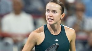 Elina Svitolina of Ukraine reacts during her game against Amanda Anisimova of the United States during round of 16 tennis action at the National Bank Open in Montreal, Sunday, Aug. 3, 2025. THE CANADIAN PRESS/Christinne Muschi