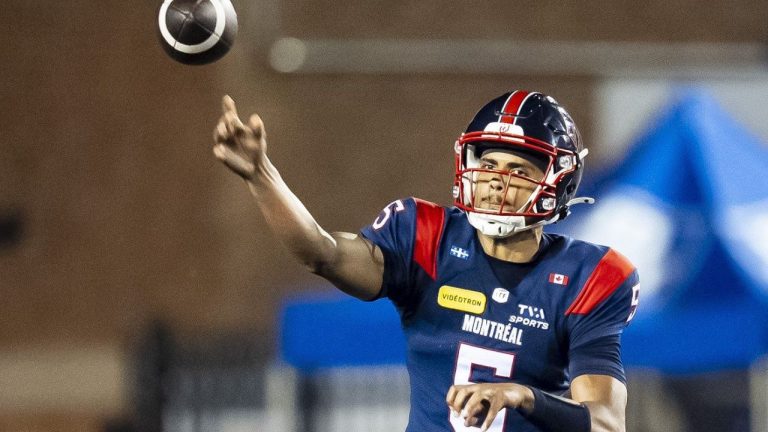 Montreal Alouettes quarterback Caleb Evans (5) throws the ball during second-half CFL action against the Edmonton Elks in Montreal on Friday, Aug. 8, 2025. (Christopher Katsarov/CP)