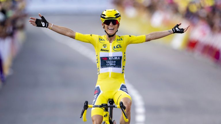 The winner of the Tour de France Femmes Pauline Ferrand-Prevot from France of team Visma - Lease a Bike celebrates as she crosses the finish line to win the 9th stage of the 4th edition of the Women's Tour de France cycling race, 124,1 km from Praz-Sur-Arly to Chatel Les Portes du Soleil, in Chatel, France, Sunday Aug. 3, 2025. (Jean-Christophe Bott/AP)