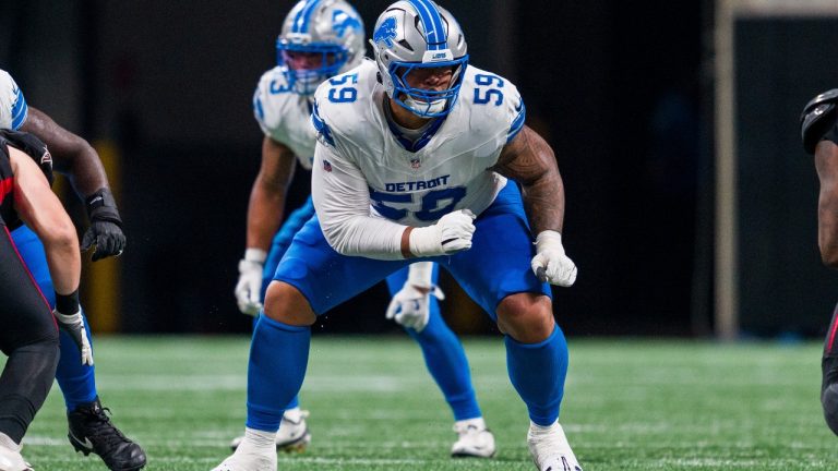Detroit Lions offensive tackle Giovanni Manu (59) works during the first half of an NFL preseason football game against the Atlanta Falcons, Friday, Aug. 8, 2025, in Atlanta. (AP Photo/Danny Karnik)