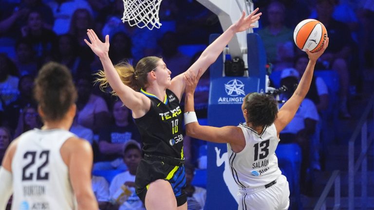 Golden State Valkyries forward Janelle Salaun (13) shoots against Dallas Wings centre Luisa Geiselsoder (18) during the first half of a WNBA basketball game in Arlington, Texas, Sunday, Aug. 24, 2025. (LM Otero/AP)