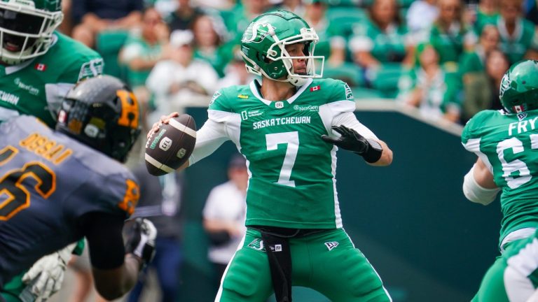 Saskatchewan Roughriders quarterback Trevor Harris (7) looks downfield during the first half of CFL football action against the Hamilton Tiger-Cats in Regina, Saturday, Aug. 16, 2025. (Heywood Yu/CP)