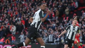 Newcastle's Alexander Isak celebrates after scoring his side's second goal during the EFL Cup final soccer match between Liverpool and Newcastle at Wembley Stadium in London, Sunday, March 16, 2025. (Scott Heppell/AP)