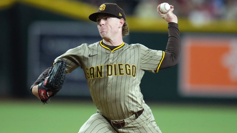 San Diego Padres starting pitcher JP Sears throws against the Arizona Diamondbacks during the first inning of a baseball game Monday, Aug. 4, 2025, in Phoenix. (Ross D. Franklin/AP)