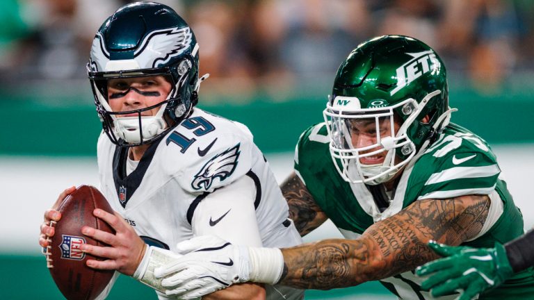 Philadelphia Eagles quarterback Kyle McCord (19) is sacked by New York Jets defensive end Braiden McGregor (55) during an NFL football game on Friday, Aug. 22, 2025, in East Rutherford, N.C. (Rusty Jones/AP)