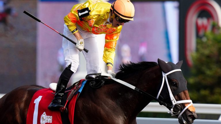 Jockey Pietro Moran, riding Mansetti, celebrates his win of the King's Plate horse race, in Toronto, Saturday, Aug. 16, 2025. (Frank Gunn/CP)