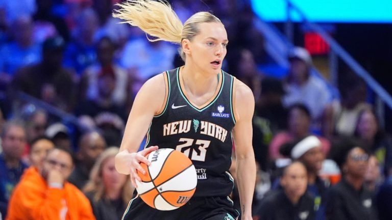 New York Liberty guard Marine Johannes dribbles during the first half of a WNBA basketball game against the Dallas Wings in Arlington, Texas, Monday, July 28, 2025. (AP Photo/LM Otero)