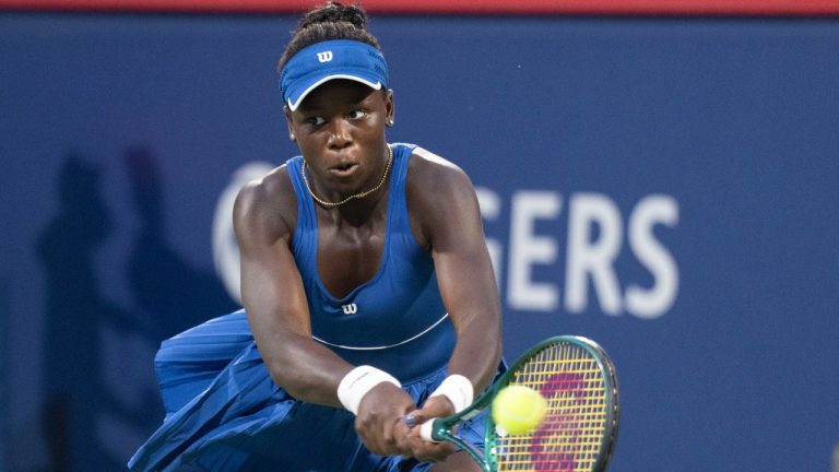 Victoria Mboko of Canada hits a return to Jessica Bouzas Maneiro of Spain during quarterfinal tennis action at the National Bank Open in Montreal, Monday, Aug. 4, 2025. (Christinne Muschi/CP)