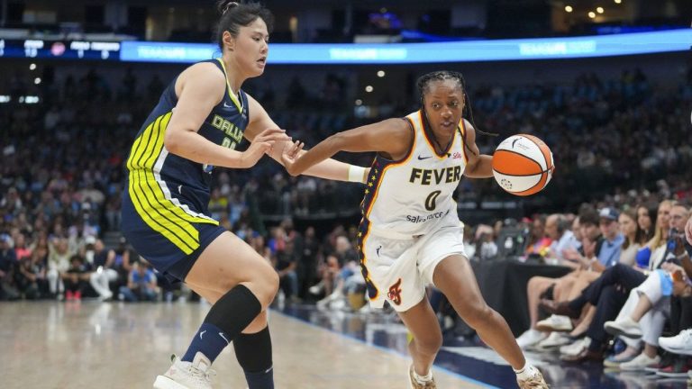 Indiana Fever guard Kelsey Mitchell drives against Dallas Wings centre Li Yueru during the first half of a WNBA game Friday, Aug. 1, 2025, in Dallas. (AP/Julio Cortez)
