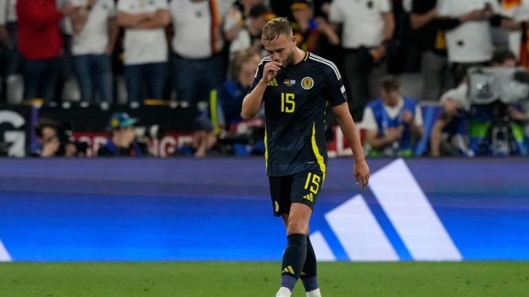 Scotland's Ryan Porteous leaves the pitch after he saw the red card during a Group A match between Germany and Scotland at the Euro 2024 soccer tournament in Munich, Germany, Friday, June 14, 2024. (Frank Augstein/AP)