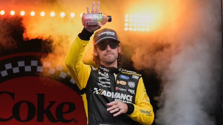 Ryan Blaney waves to fans during driver introductions before a NASCAR Cup Series auto race at Daytona International Speedway, Saturday, Aug. 23, 2025, in Daytona Beach, Fla. (John Raoux/AP)
