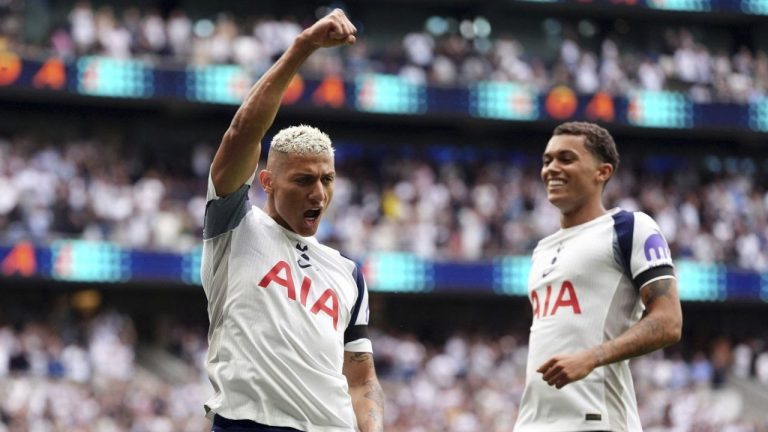 Tottenham Hotspur's Richarlison, left, celebrates scoring the opening goal during the the English Premier League soccer match between Tottenham Hotspur and Burnley at the Tottenham Hotspur Stadium in London, Saturday, Aug. 16, 2025. (Adam Davy/PA via AP)