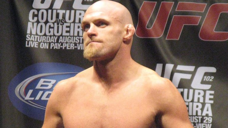 Light-heavyweight Keith (The Dean of Mean) Jardine poses on the scales at the weight-in for UFC102 in Portland, Ore. on Friday Aug. 28, 2009. (Neil Davidson/CP)