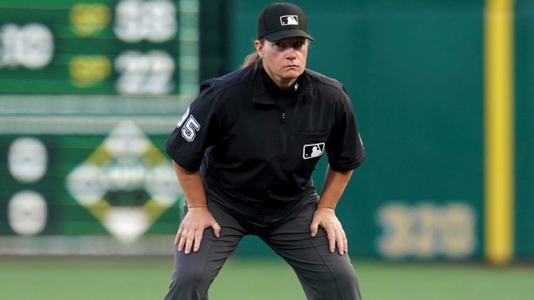 Umpire Jen Pawol watches during the first inning of a baseball game between the Colorado Rockies and the Pittsburgh Pirates, Friday, Aug. 22, 2025, in Pittsburgh. (Matt Freed/AP)