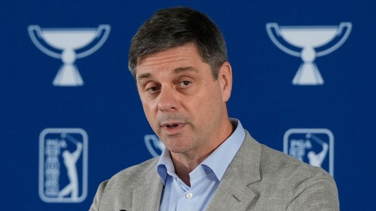 PGA Tour CEO Brian Rolapp speaks before a practice round of the Tour Championship golf tournament, Aug. 20, 2025, in Atlanta. (AP Photo/Mike Stewart, File)