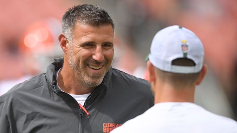Cleveland Browns coaching and personnel consultant Mike Vrabel, left, stands on the field before an NFL preseason football game against the Green Bay Packers, Aug. 10, 2024, in Cleveland. (AP Photo/David Richard)