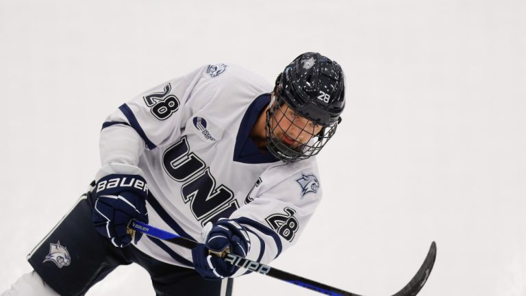 New Hampshire defenceman Alex Gagne (28) takes a shot during warm-ups of an NCAA hockey game against Stonehill on Saturday, Oct. 5, 2024, in Durham, N.H. (Greg M. Cooper/AP)