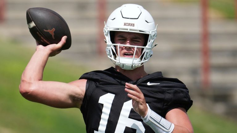 Texas quarterback Arch Manning (16) throws during an NCAA college football practice in Austin, Texas, Wednesday, July 30, 2025. (Eric Gay/AP Photo)