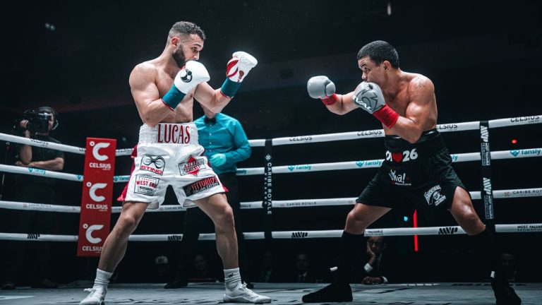 Unbeaten Canadian lightweight boxer (Prince) Lucas Bahdi, white trunks, is shown in this handout photo, in his win over Filipino southpaw Ryan (The Untouchable) Racaza at the Great Canadian Casino Resort Toronto, on March 25, 2025. (THE CANADIAN PRESS/Handout - Most Valuable Promotions, Josh Schofield)