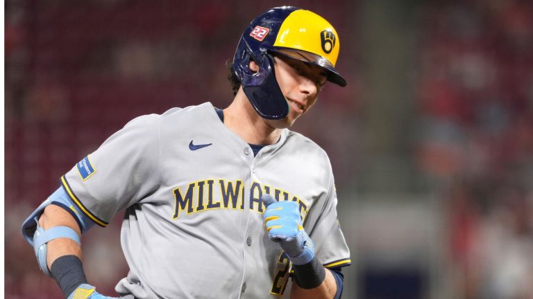 Milwaukee Brewers' Christian Yelich rounds third base after hitting a solo home run in the sixth inning of a baseball game against the Cincinnati Reds, Friday, Aug. 15, 2025, in Cincinnati. (Kareem Elgazzar/AP)