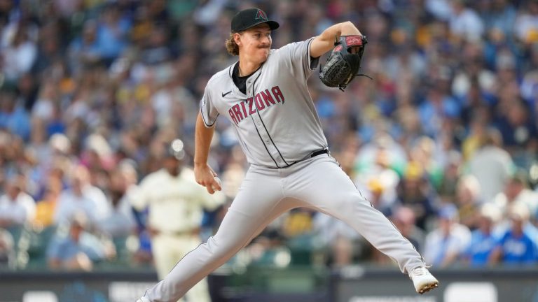 Arizona Diamondbacks pitcher Taylor Rashi throws during the eighth inning of his major league debut in a baseball game against the Milwaukee Brewers, Thursday, Aug. 28, 2025, in Milwaukee. (Kayla Wolf/AP)