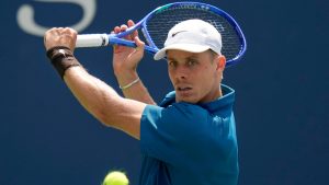 Denis Shapovalov, of Canada, returns a shot to Marton Fucsovics, of Hungary, during the first round of the US Open tennis championships, Tuesday, Aug. 26, 2025, in New York. (Seth Wenig/AP)