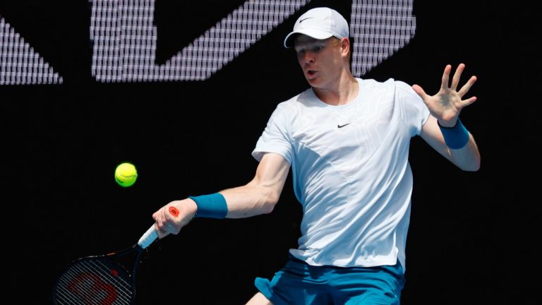 Kyle Edmund of Britain plays a forehand return to Jannik Sinner of Italy during their first round match at the Australian Open tennis championship in Melbourne, Australia, Monday, Jan. 16, 2023. (Asanka Brendon Ratnayake/AP)