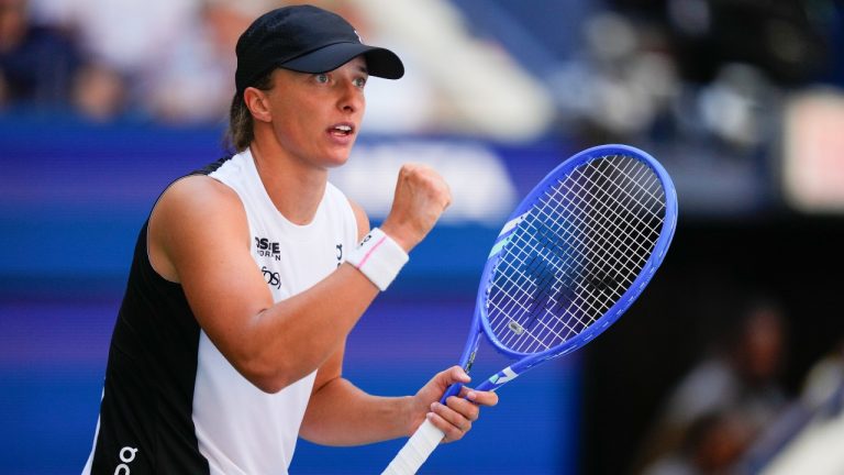 Iga Swiatek, of Poland, reacts after scoring a point against Emiliana Arango, of Colombia, during the first round of the US Open tennis championships, Tuesday, Aug. 26, 2025, in New York. (Yuki Iwamura/AP)