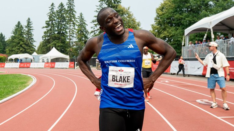 Jerome Blake celebrates winning the men's 200m senior finals during the Canadian Track and Field Championships in Ottawa, on Sunday, Aug. 3, 2025. (Spencer Colby/CP)