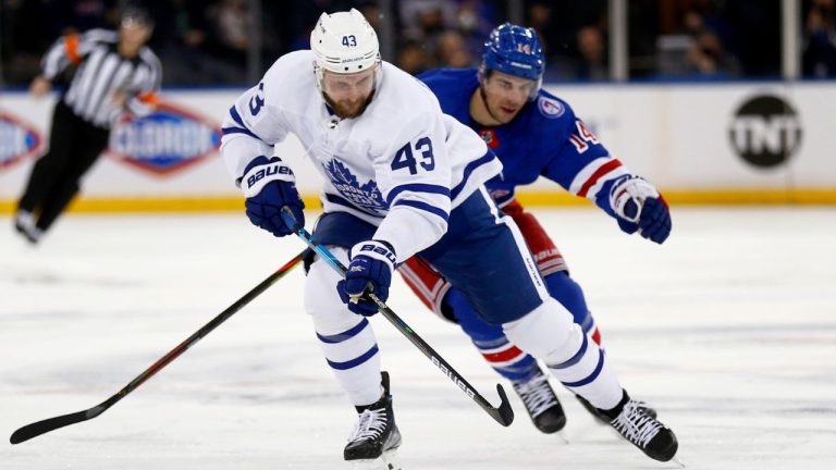 Maple Leafs Rangers Hockey
Toronto Maple Leafs' Kyle Clifford (43) skates up ice with New York Rangers' Greg McKegg (14) in pursuit during the first period of an NHL hockey game Wednesday, Jan. 19, 2022, in New York. (John Munson/AP)