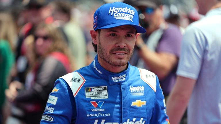 Kyle Larson walks to his car before a NASCAR Cup Series auto race at Michigan International Speedway in Brooklyn, Mich., Sunday, June 8, 2025. (Paul Sancya/AP)