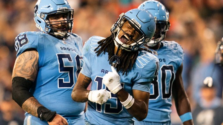 Toronto Argonauts wide receiver Makai Polk celebrates with teammates after making a play against the Hamilton Tiger-Cats in the first half of CFL football action, in Toronto, on Friday, September 20, 2024. (Paige Taylor White/CP)