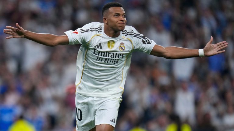 Real Madrid's Kylian Mbappe celebrates after scoring from a penalty kick during the La Liga soccer match between Real Madrid and Osasuna in Madrid, Spain, Tuesday, Aug. 19, 2025. (Manu Fernandez/AP)