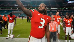 Miami defensive lineman Akheem Mesidor celebrates with fans after an NCAA college football game against Miami (Ohio), Friday, Sept. 1, 2023, in Miami Gardens, Fla. (Wilfredo Lee/AP Photo)