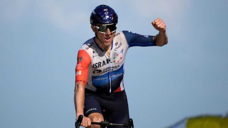 Canada's Michael Woods approaches the finish line to win the ninth stage of the Tour de France cycling race over 182.5 kilometres (113.5 miles) with start in Saint-Leonard-de-Noblat and finish in Puy de Dome, France, Sunday, July 9, 2023. (Daniel Cole/AP)