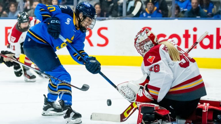 Ottawa Charge goaltender Emerance Maschmeyer (38) makes a save against Toronto Sceptres' Sarah Nurse (20) during second period PWHL hockey action, in Toronto on Tuesday, December 31, 2024. (Christopher Katsarov/CP)