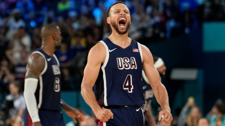 United States' Stephen Curry (4) celebrates after beating France to win the gold medal during a men's gold medal basketball game at Bercy Arena at the 2024 Summer Olympics, Saturday, Aug. 10, 2024, in Paris, France. (Mark J. Terrill/AP)