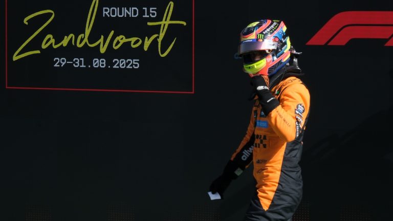 McLaren driver Oscar Piastri of Australia celebrates his pole position after the qualifying session ahead of the Formula One Dutch Grand Prix at the Zandvoort racetrack in Zandvoort, Netherlands, Saturday, Aug. 30, 2025. (Patrick Post/AP)
