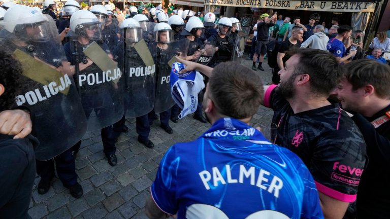 Riot police confront Chelsea fans ahead of the Europa Conference League final soccer match between Real Betis and Chelsea in Wroclaw, Poland, Tuesday, May 27, 2025. (Czarek Sokolowski/AP)