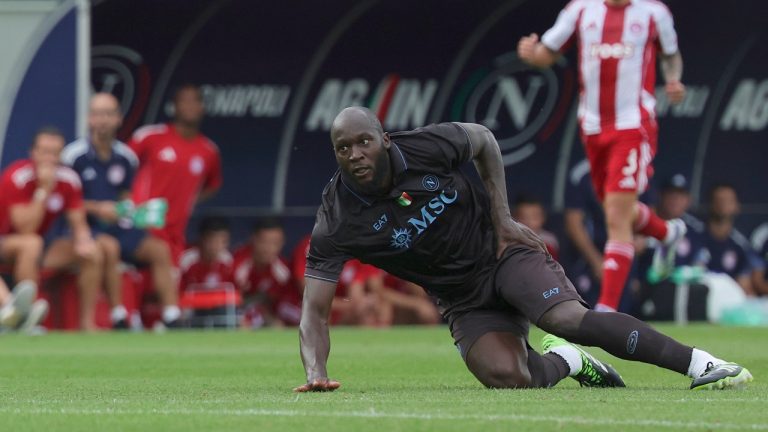 Napoli's Romelu Lukaku reacts after an injury during a friendly soccer match between Napoli and Olympiakos at the Teofilo Patini Stadium in Castel Di Sangro, Italy, Thursday, Aug. 14 , 2025. (Alessandro Garofalo/LaPresse via AP)