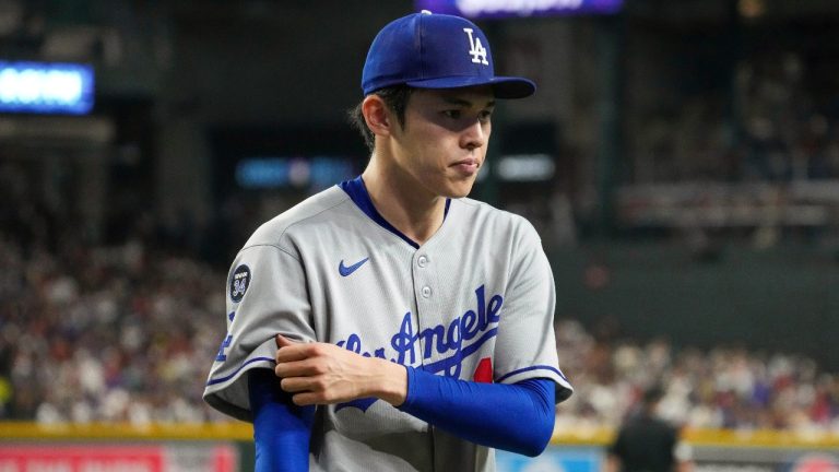 Los Angeles Dodgers pitcher Roki Sasaki, of Japan, walks off the field against the Arizona Diamondbacks during the fifth inning of a baseball game Friday, May 9, 2025, in Phoenix. (Darryl Webb/AP)