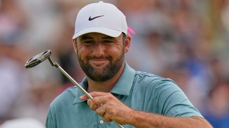 Scottie Scheffler celebrates on the 18th green after winning the BMW Championship golf tournament Sunday, Aug. 17, 2025, in Owings Mills, Md. (Stephanie Scarbrough/AP)