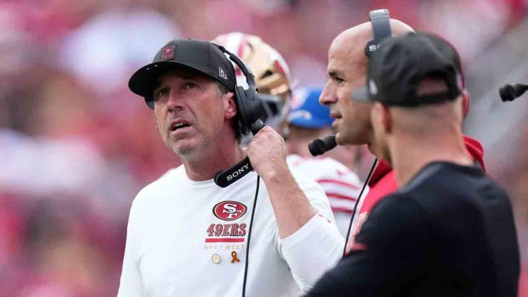 San Francisco 49ers head coach Kyle Shanahan, left, reacts next to defensive coordinator Robert Saleh, middle, during the first half of an NFL football game against the Jacksonville Jaguars in Santa Clara, Calif., Sunday, Sept. 28, 2025. (Godofredo A. Vásquez/AP)