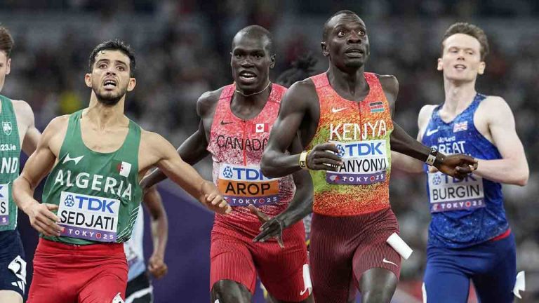 Kenya's Emmanuel Wanyonyi, gold, Algeria's Djamel Sedjati, silver, and Canada's Marco Arop, bronze, cross the line after the men's 800-metre final at the world athletics championships in Tokyo, Saturday, Sept. 20, 2025. (Petr David Josek/AP)
