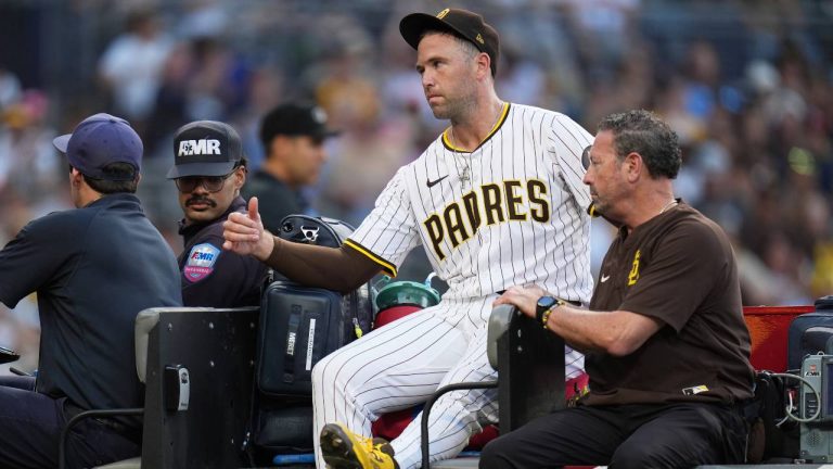 San Diego Padres relief pitcher Jason Adam leaves in a cart after falling with an injury during the seventh inning of a baseball game against the Baltimore Orioles Monday, Sept. 1, 2025, in San Diego. (Gregory Bull/AP)