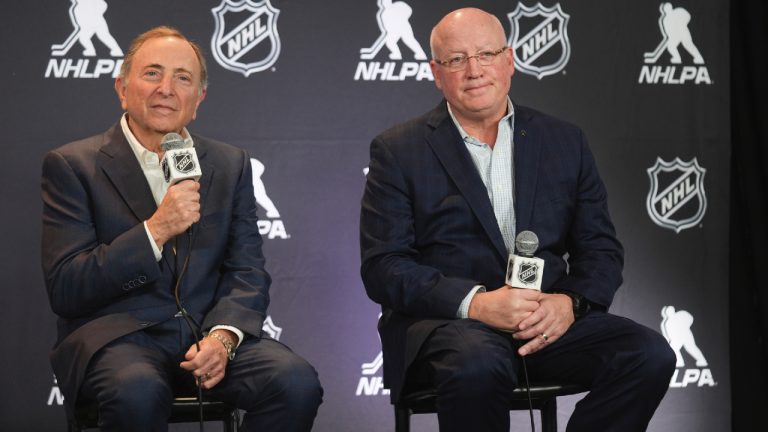 NHL Commissioner Gary Bettman, left, and Bill Daly, NHL Deputy Commissioner, conduct a joint press conference before the NHL hockey draft Friday, June 27, 2025, in Los Angeles. (Damian Dovarganes/AP)