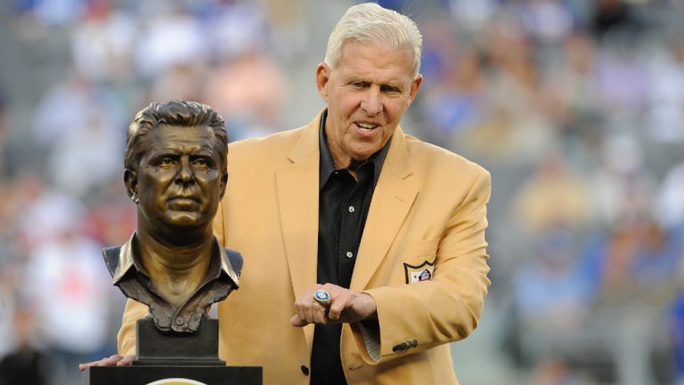 Bill Parcells poses for photographs during the halftime show of an NFL football game between the New York Giants and the Denver Broncos Sunday, Sept. 15, 2013, in East Rutherford, N.J. (Bill Kostroun/AP)