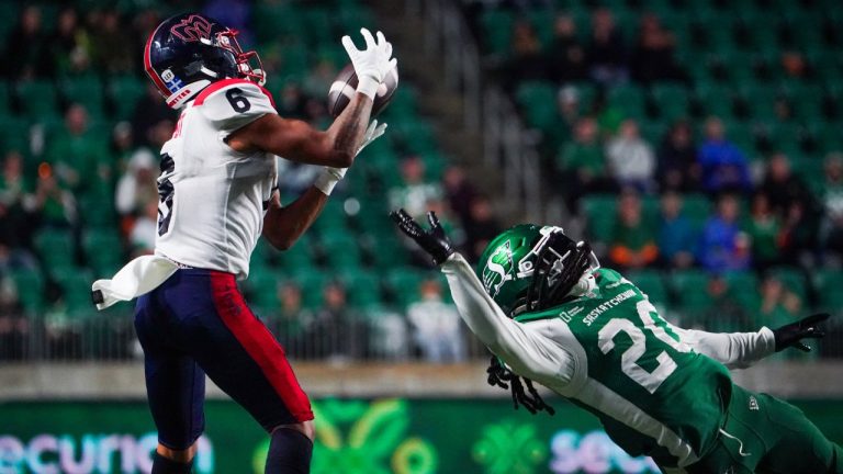Montreal Alouettes receiver Tyson Philpot (6) makes a catch in front of Saskatchewan Roughriders defensive back Kerfalla-Emmanuel Exume (20) during the second half CFL football action in Regina, on Saturday, September 13, 2025. THE CANADIAN PRESS/Heywood Yu