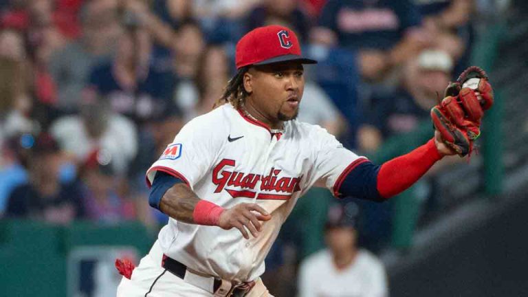 Cleveland Guardians' Jose Ramirez, left, catches a a ball hit by Texas Rangers' Ezequiel Duran as Gabriel Arias, right, backs up the play during the seventh inning of a baseball game, Saturday, Sept. 27, 2025, in Cleveland. (Phil Long/AP)
